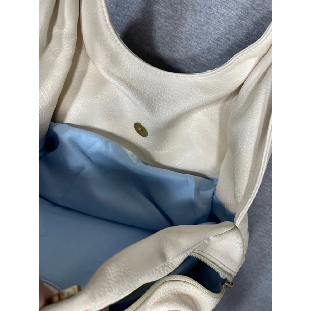 Charming Charlies cream and gold Handbag